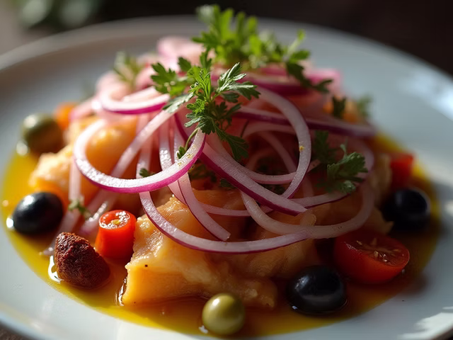 Insalata di baccalà con cipolla rossa di Tropea, pomodorini secchi e olive taggiasche