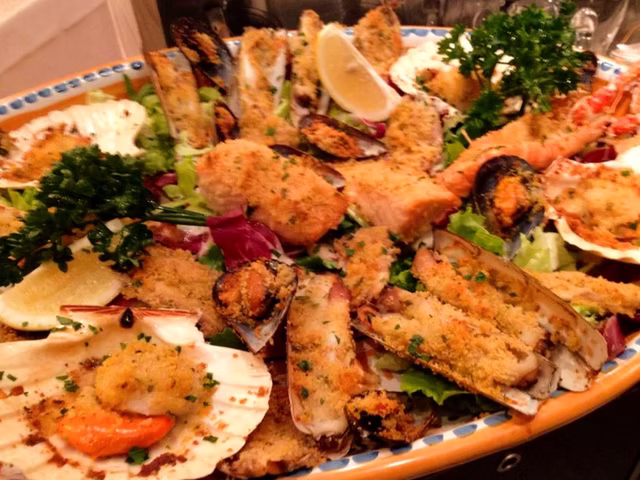 Misto di pesce* gratinato
