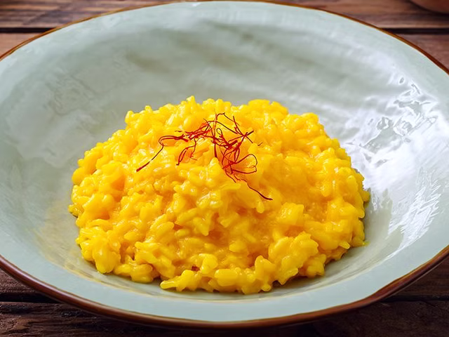 Risotto con speck, zafferano e provola affumicata